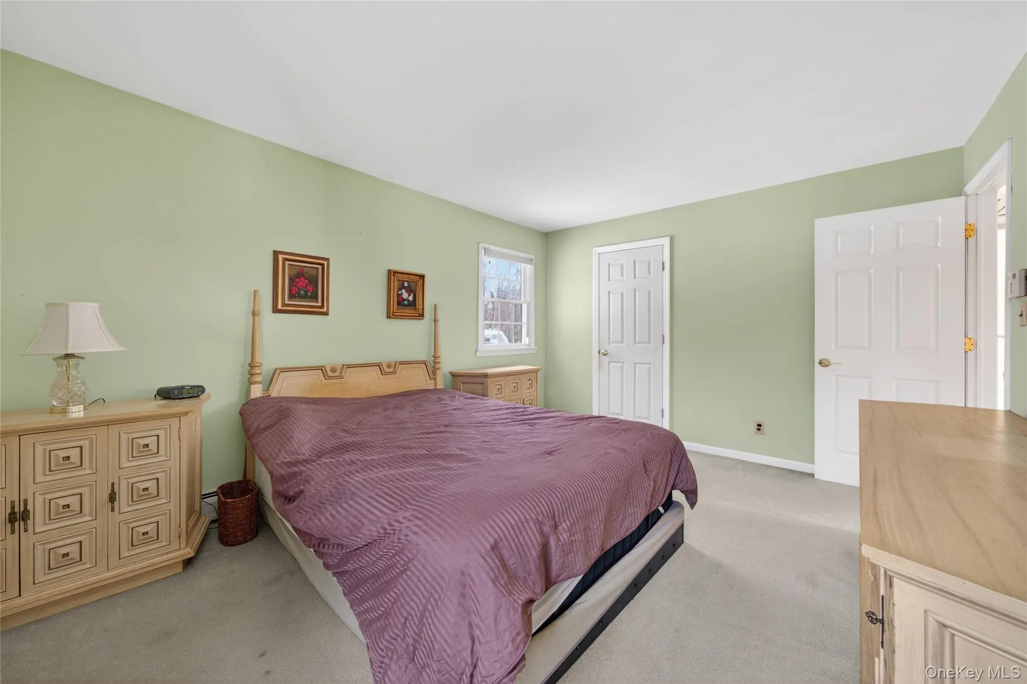 Bedroom with carpet and baseboards Bedroom with carpet and baseboards
