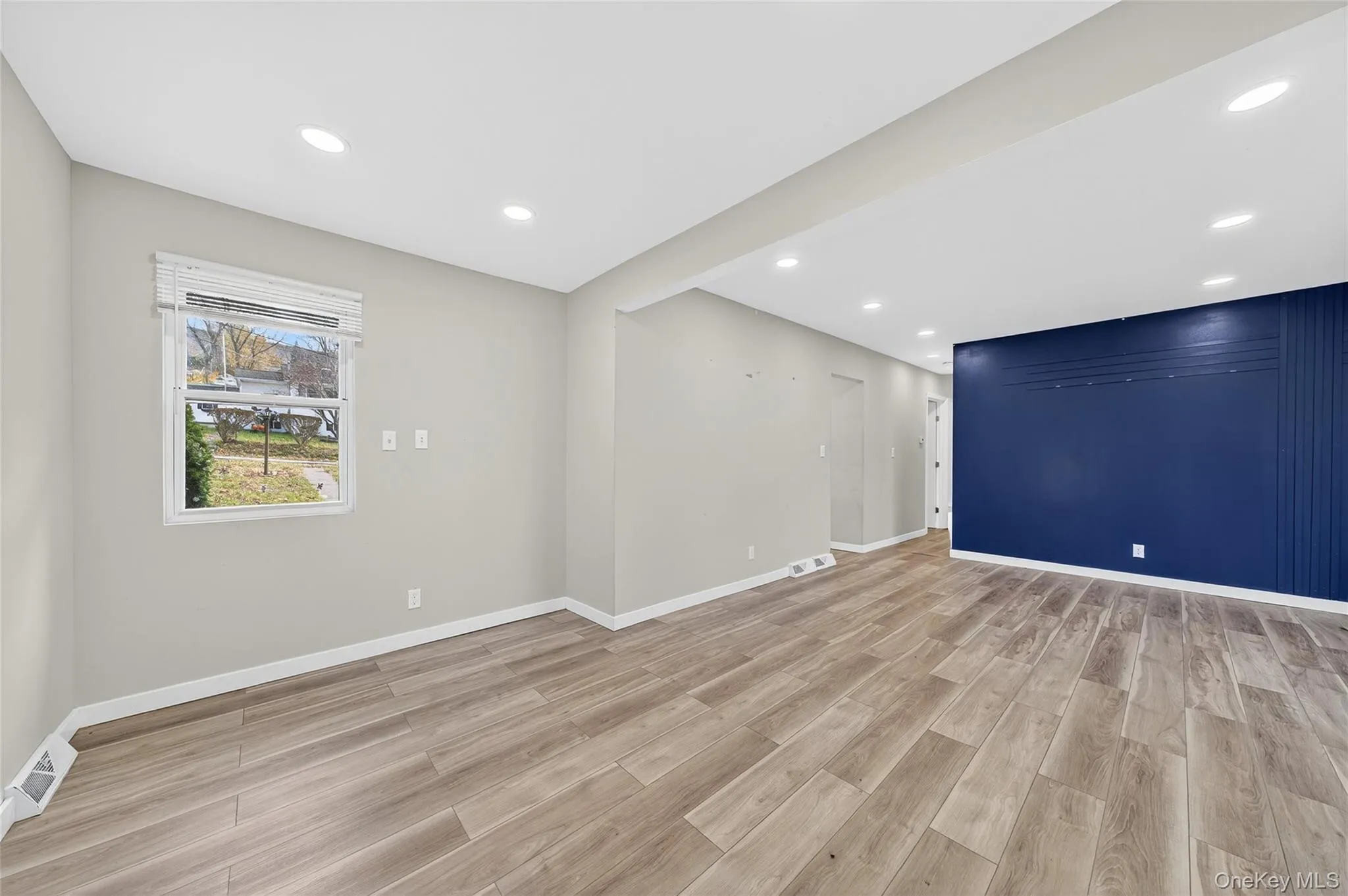 Empty room featuring recessed lighting and light wood-type flooring Empty room featuring recessed lighting and light wood-type flooring