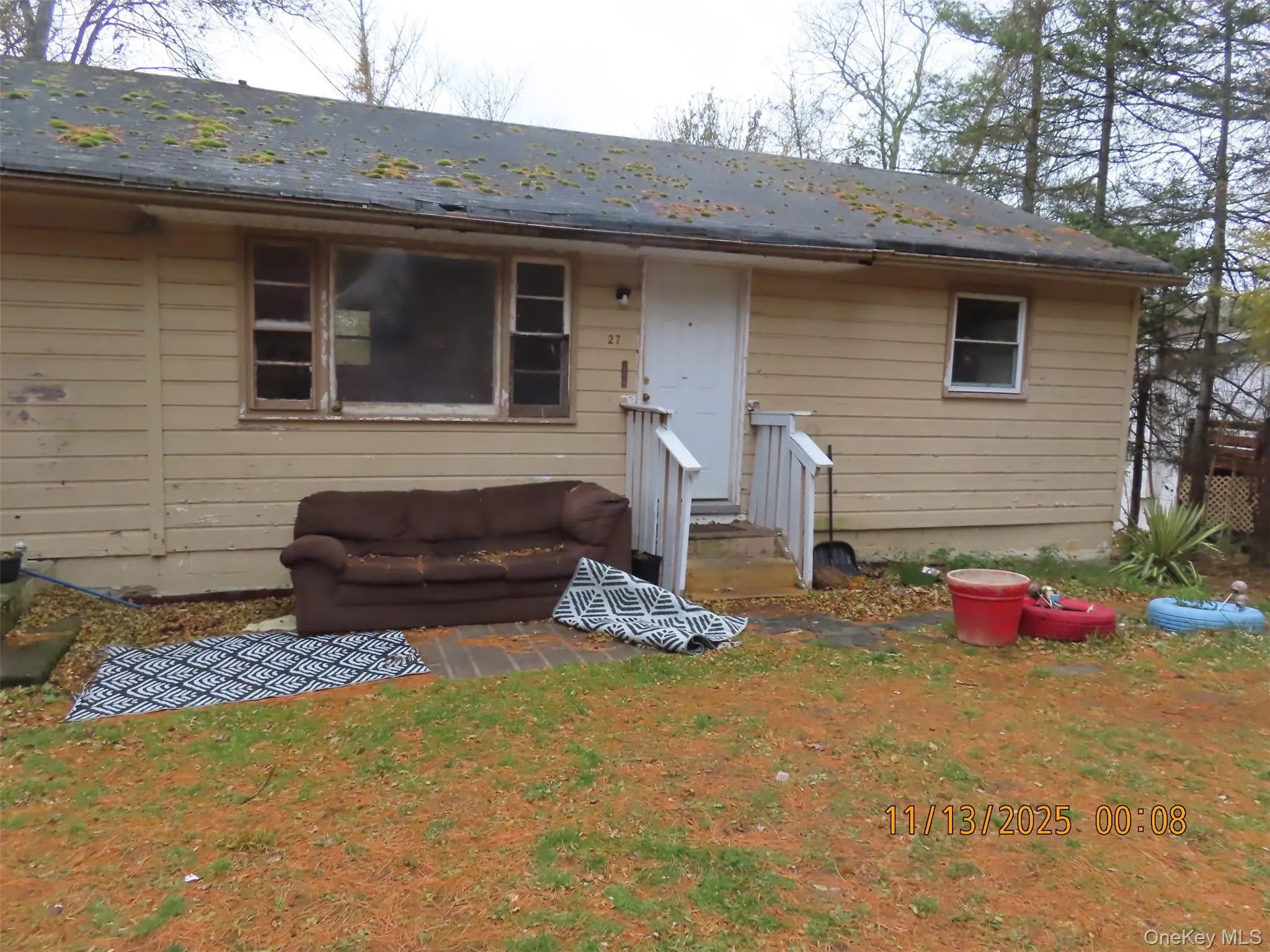 Back of property with entry steps Back of property with entry steps