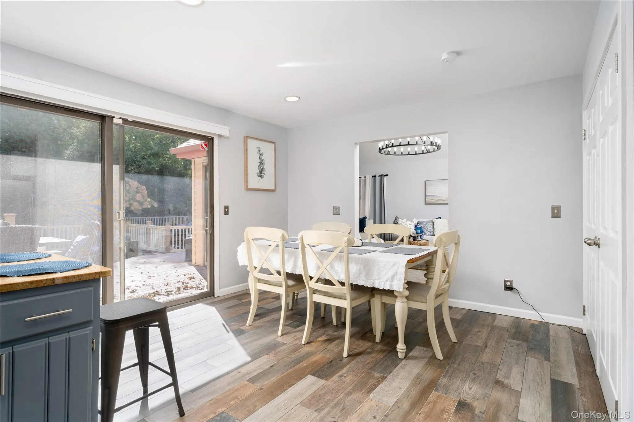 Dining room featuring wood finished floors and recessed lighting Dining room featuring wood finished floors and recessed lighting