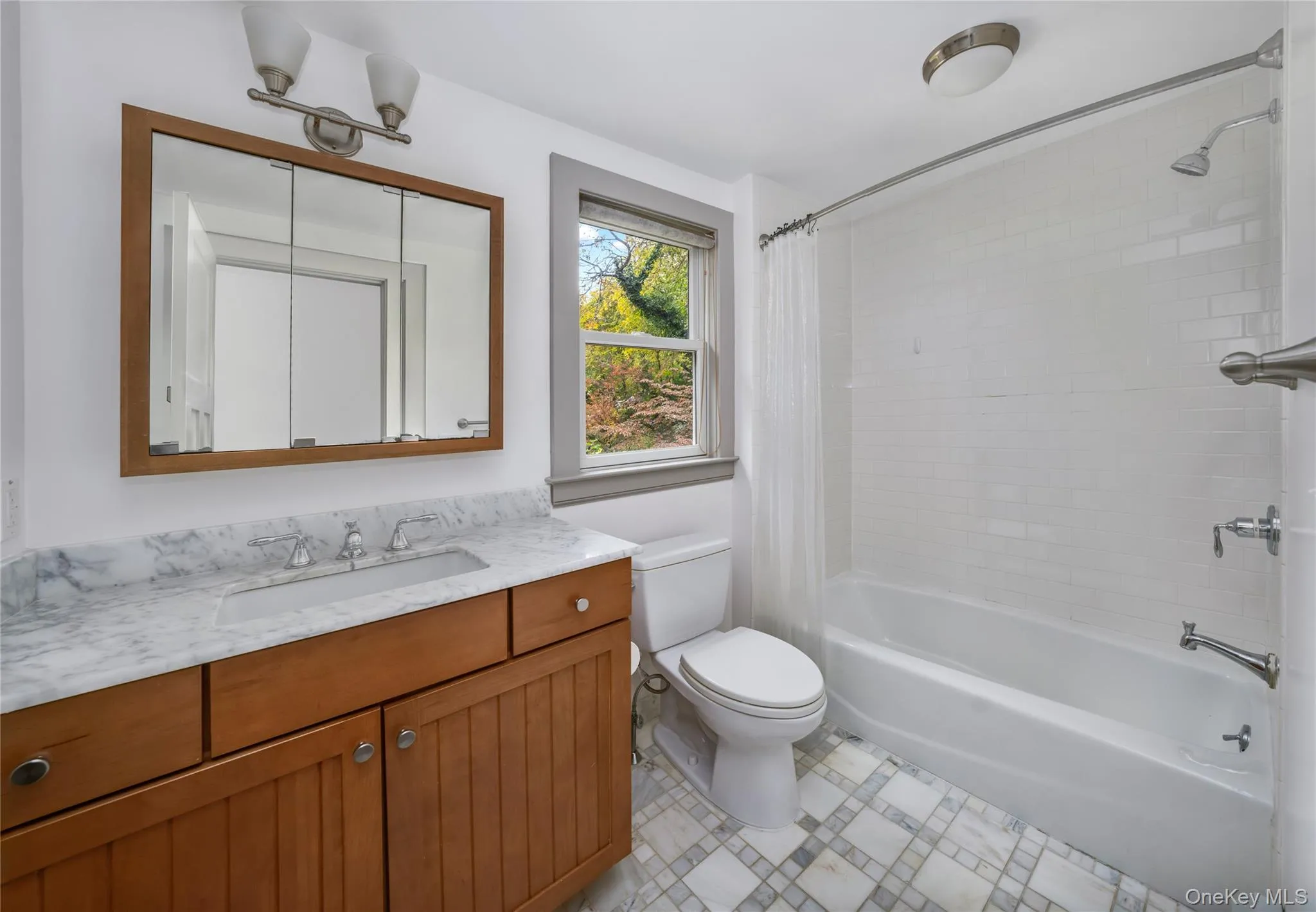 Full bath with shower / tub combo and vanity Full bath with shower / tub combo and vanity