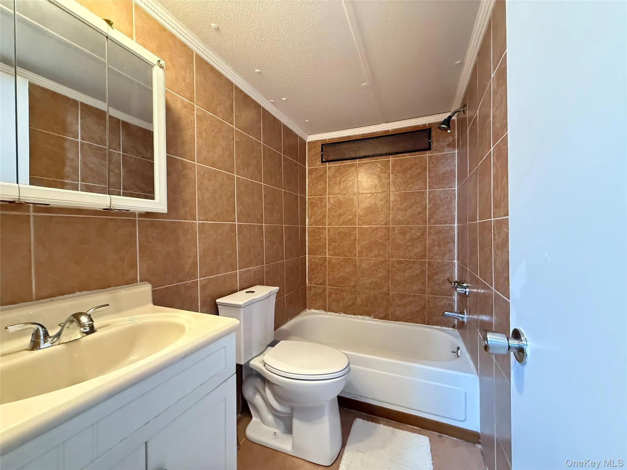 Full bath featuring bathtub Full bath featuring bathtub