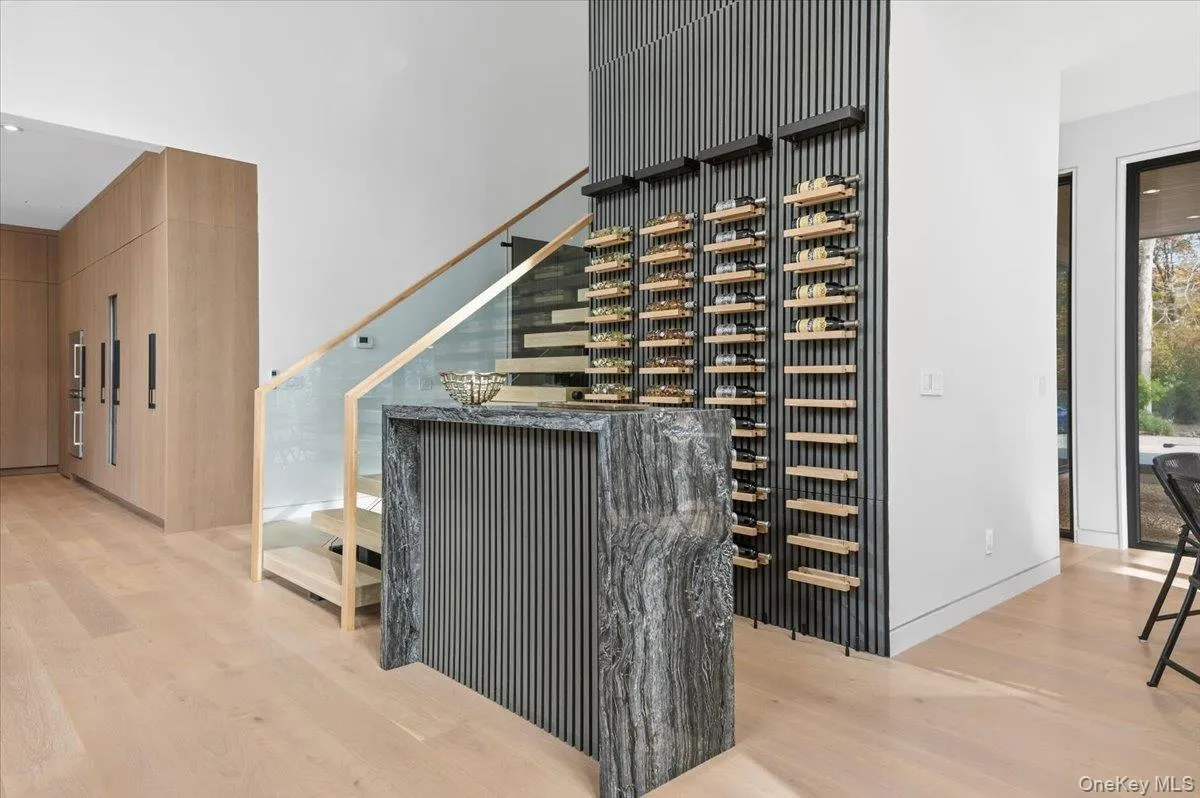 Wine area featuring light wood-style flooring