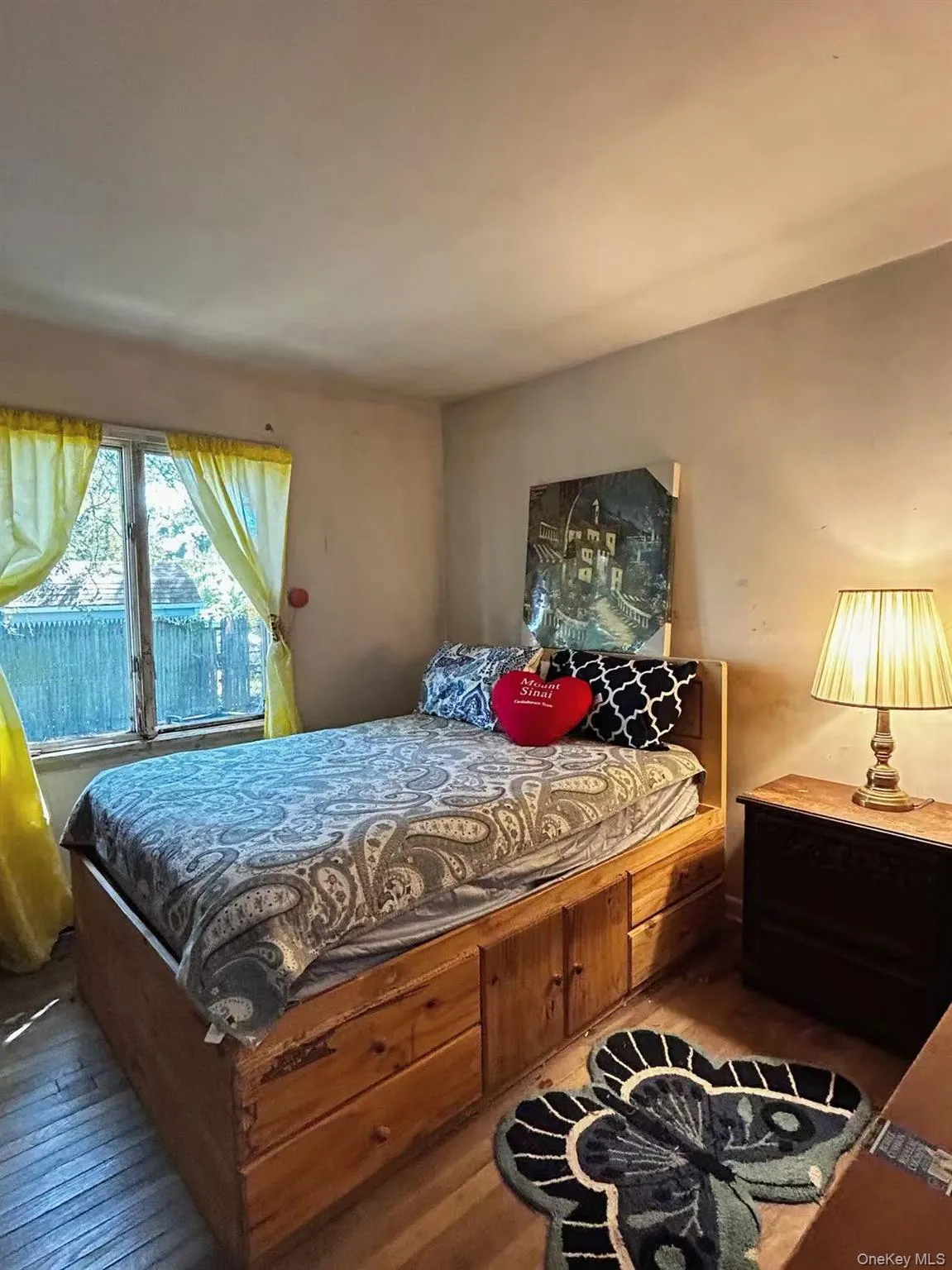 Bedroom with hardwood / wood-style flooring Bedroom with hardwood / wood-style flooring