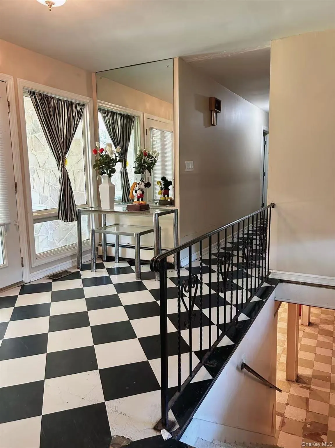 Staircase featuring tile patterned floors Staircase featuring tile patterned floors