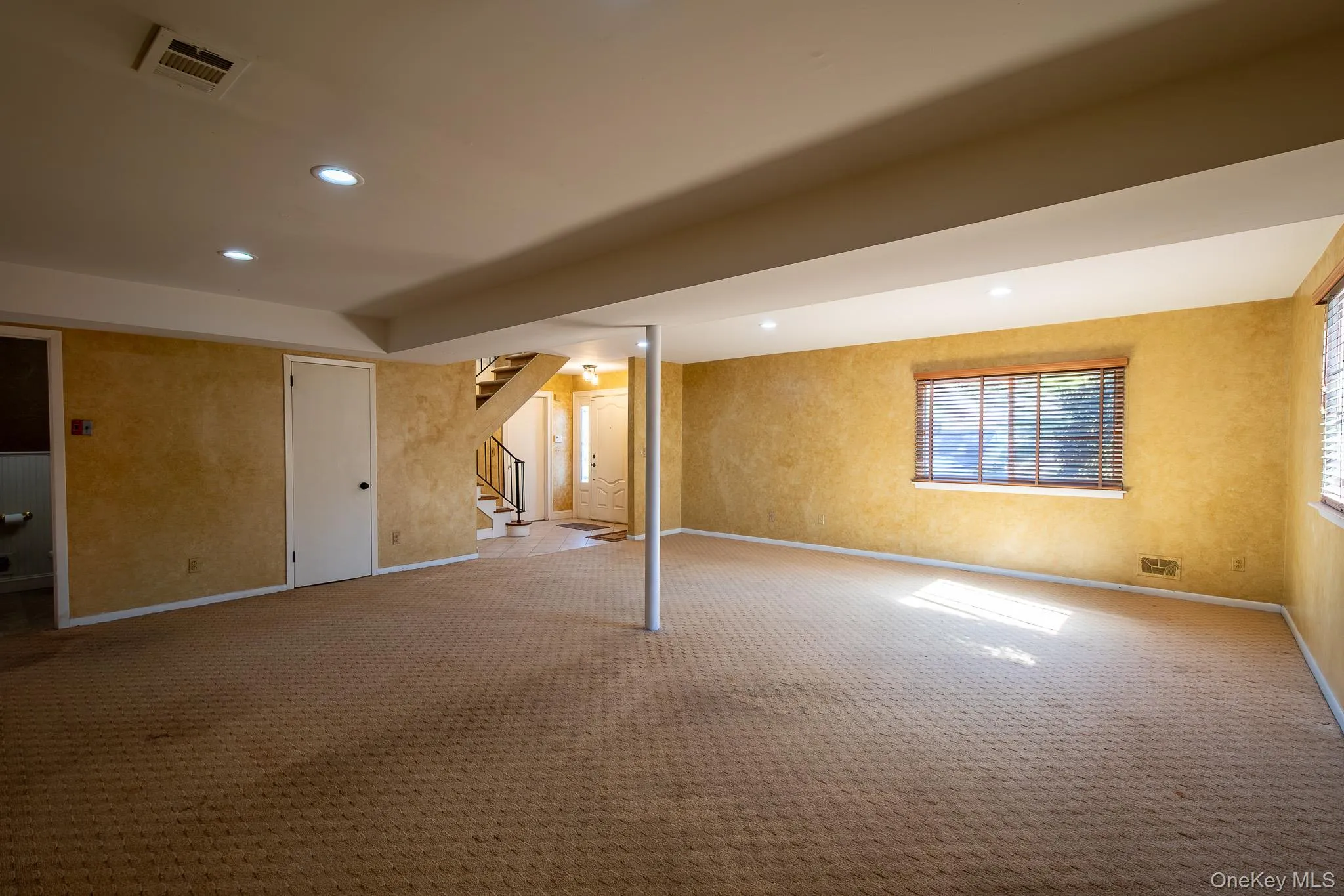 To the left of the entry, great family room To the left of the entry, great family room