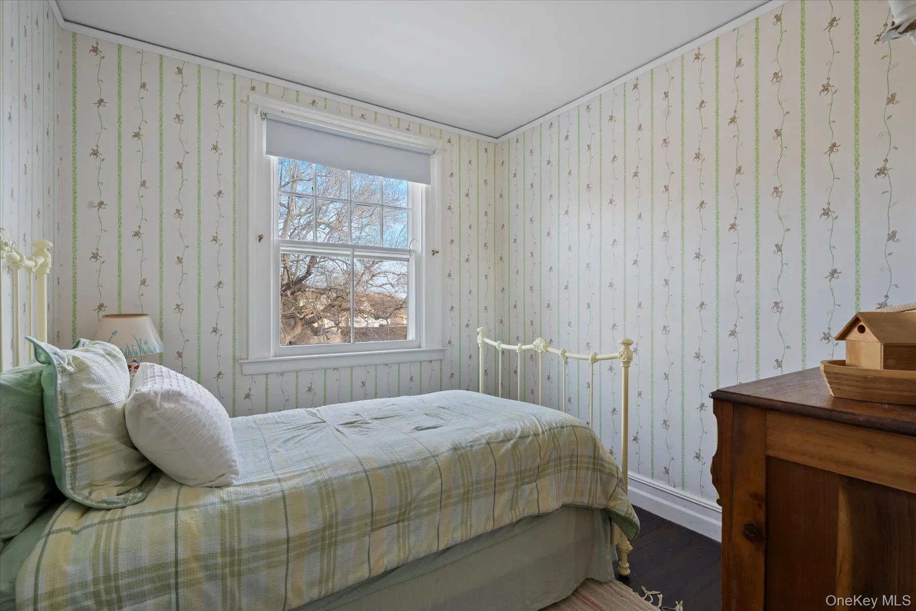 Bedroom with hardwood flooring Bedroom with hardwood flooring