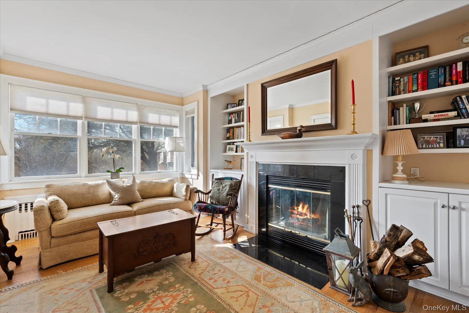 Primary Suite Den with Built-in Bookcases, and Fireplace Primary Suite Den with Built-in Bookcases, and Fireplace