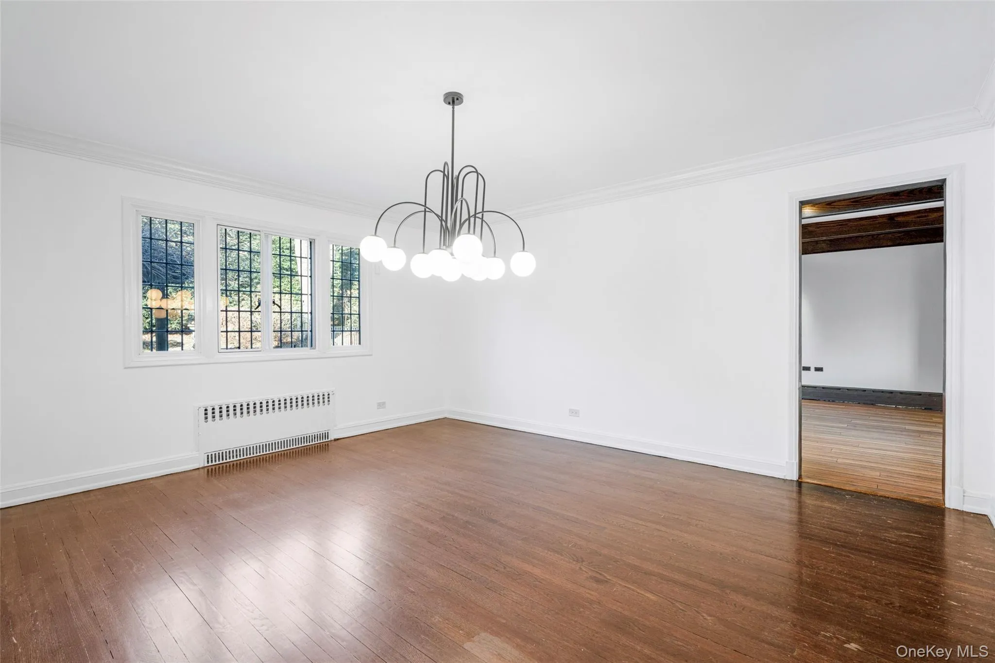 Dining room with view to family room/kitchen. Dining room with view to family room/kitchen.