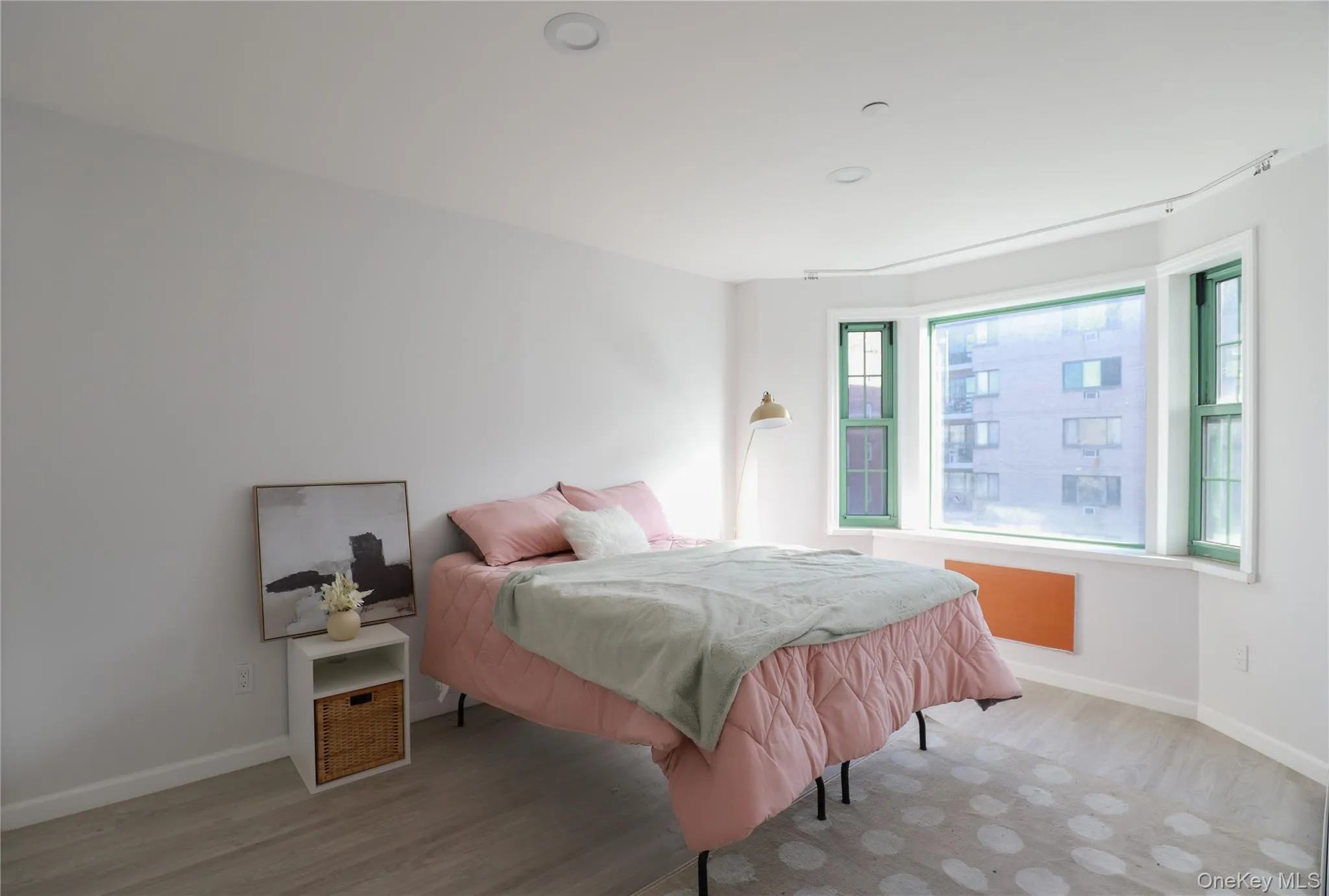 Bedroom with wood finished floors Bedroom with wood finished floors