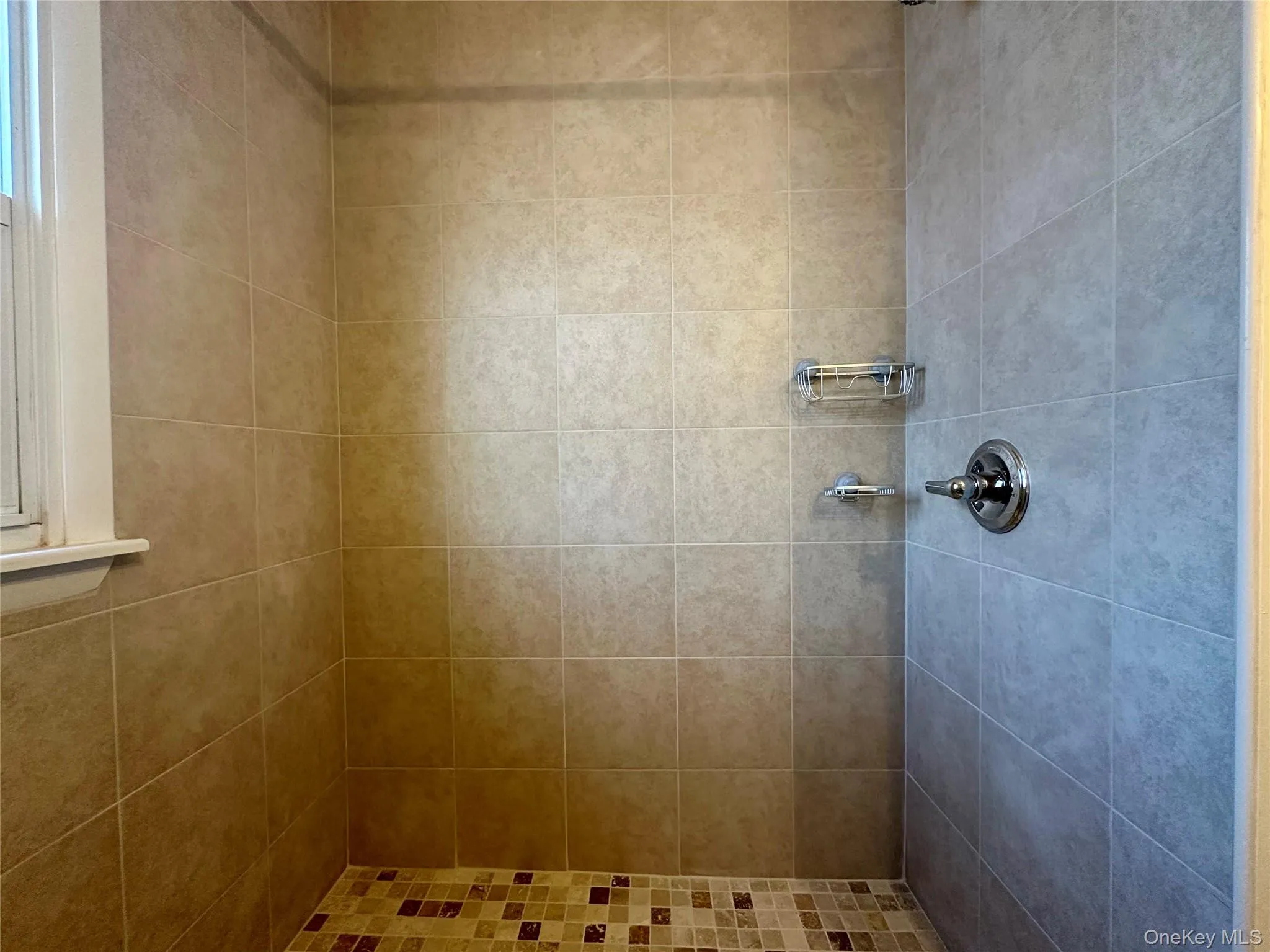 Bathroom with tiled shower Bathroom with tiled shower