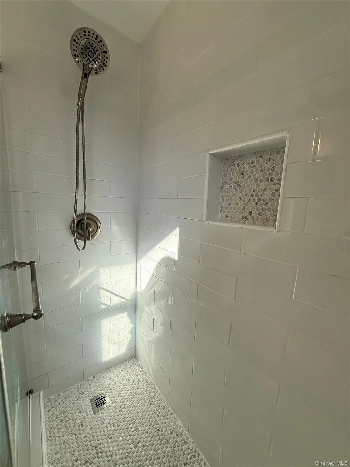 Full bath with tiled shower Full bath with tiled shower