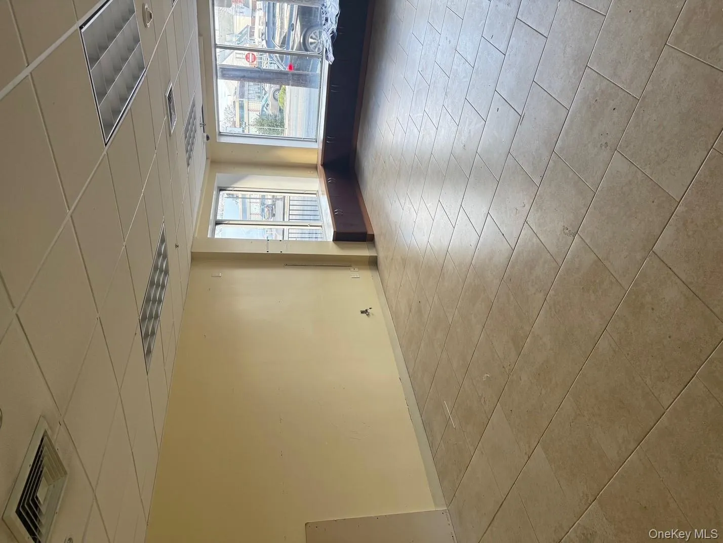 Empty room with a paneled ceiling Empty room with a paneled ceiling