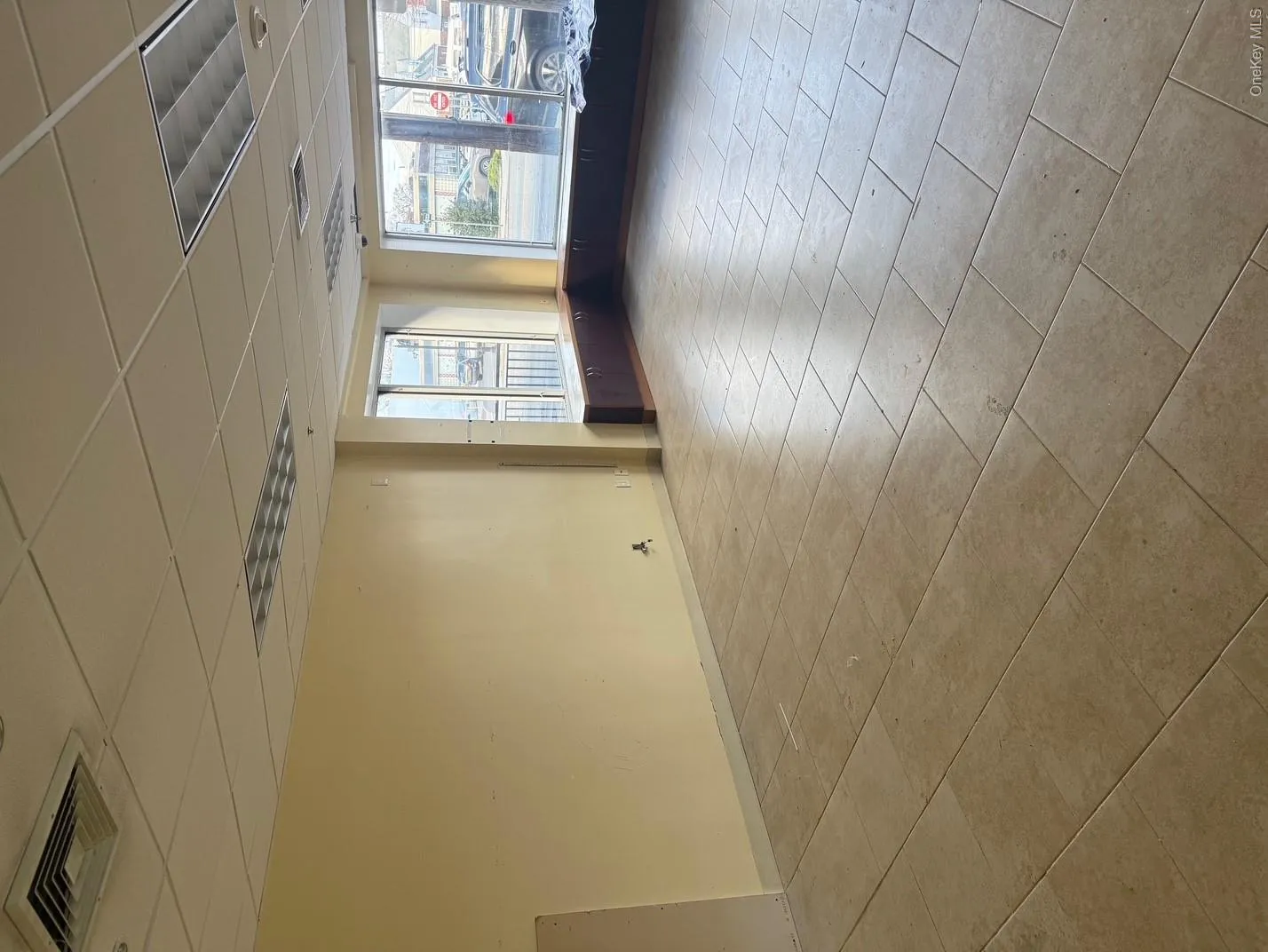 Empty room with a paneled ceiling Empty room with a paneled ceiling