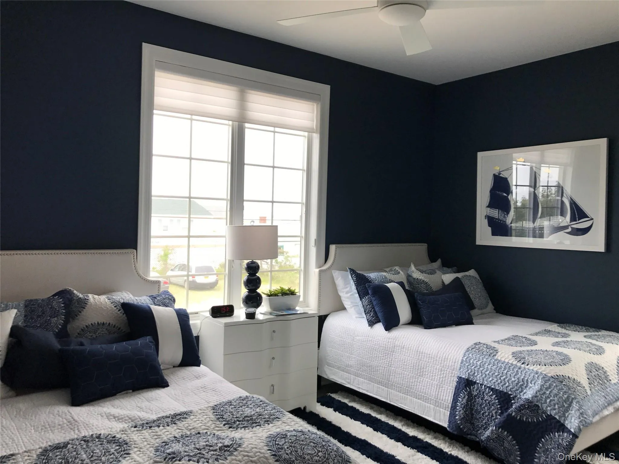 Bedroom with a ceiling fan Bedroom with a ceiling fan