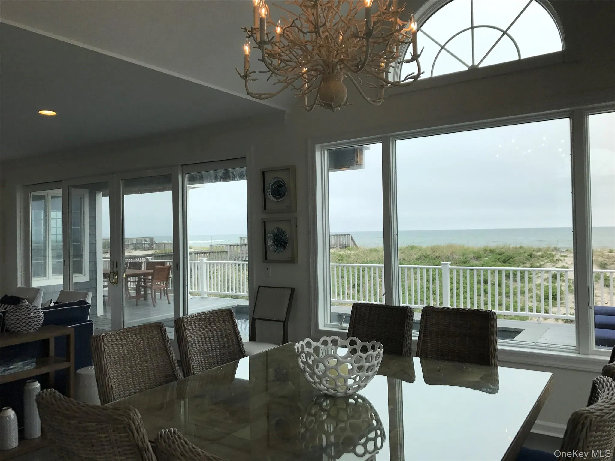 Dining area with a chandelier Dining area with a chandelier