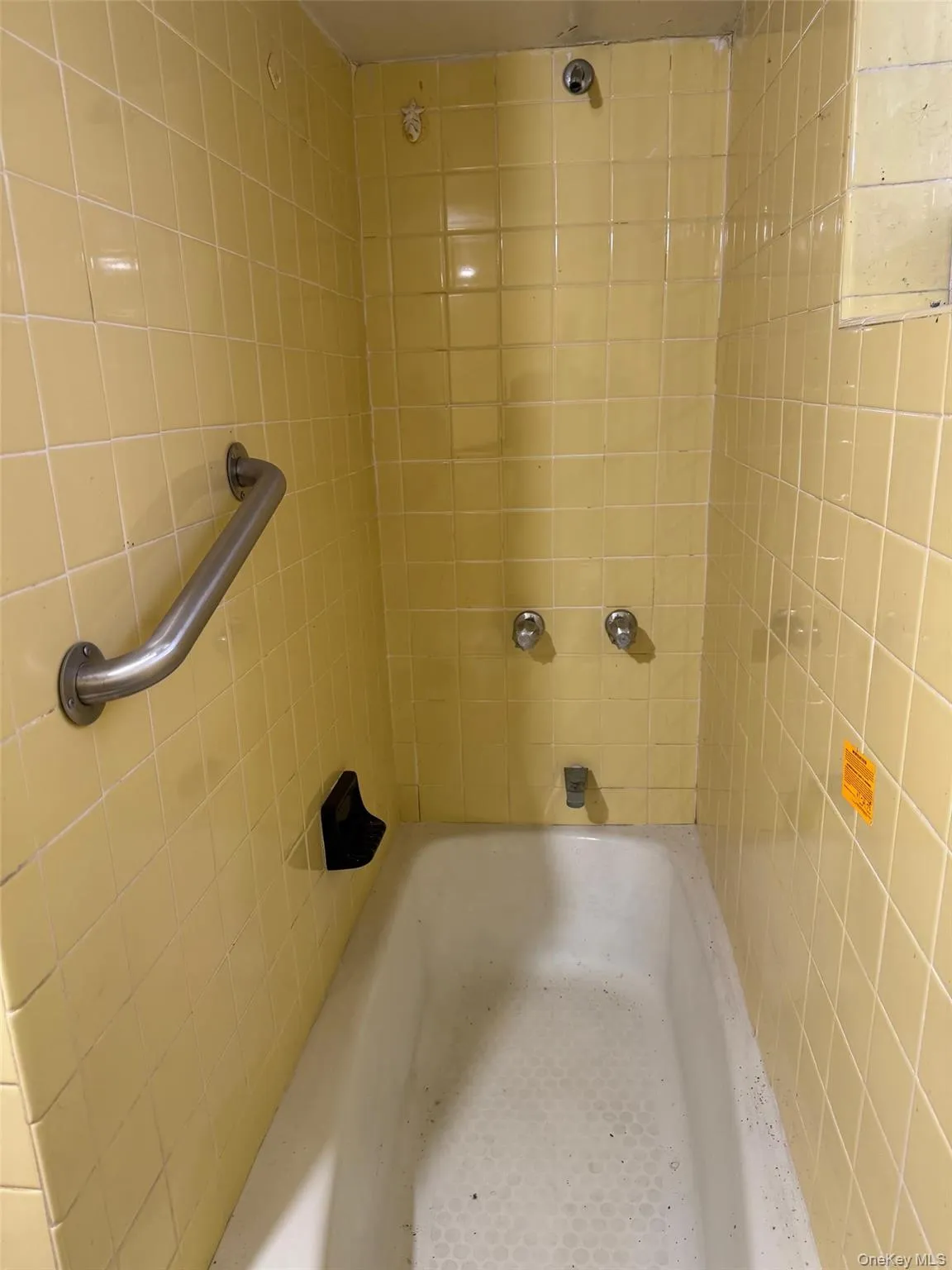 Bathroom featuring shower combination Bathroom featuring shower combination