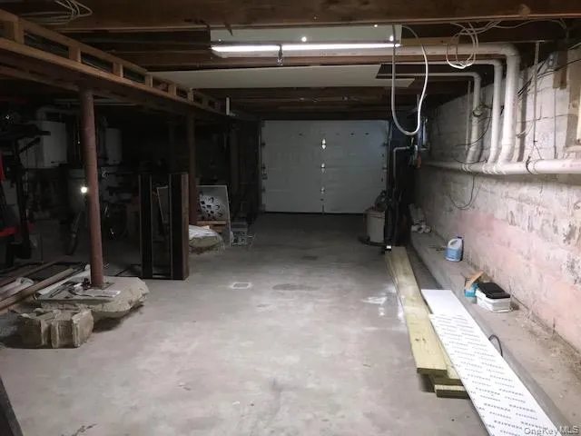 Garage featuring concrete block wall Garage featuring concrete block wall
