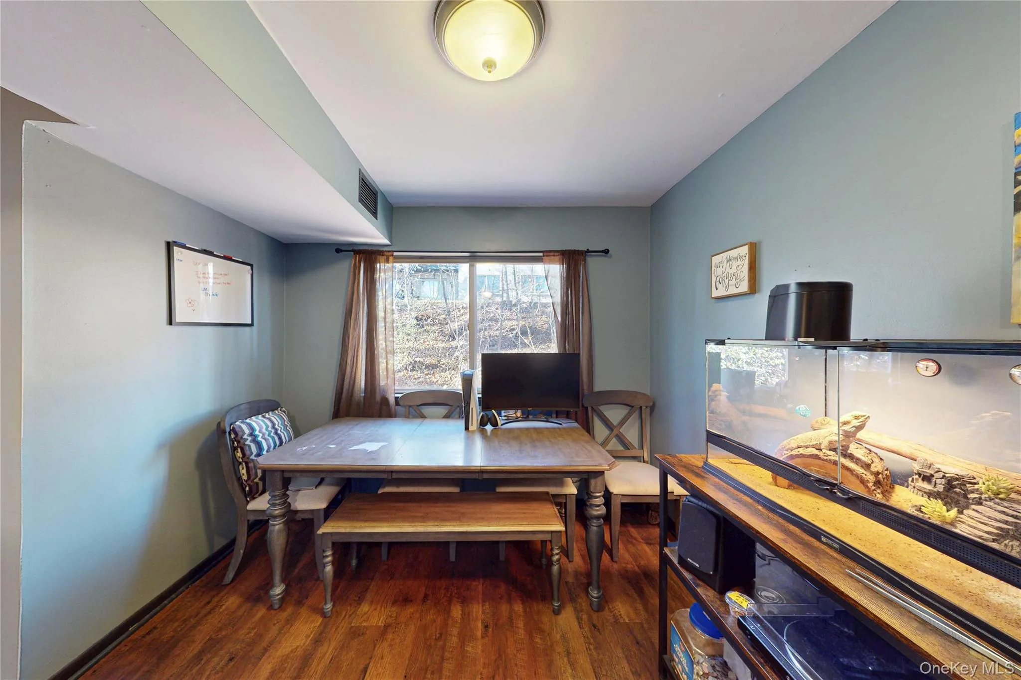 Dining Area off Kitchen featuring luxury laminate floors Dining Area off Kitchen featuring luxury laminate floors