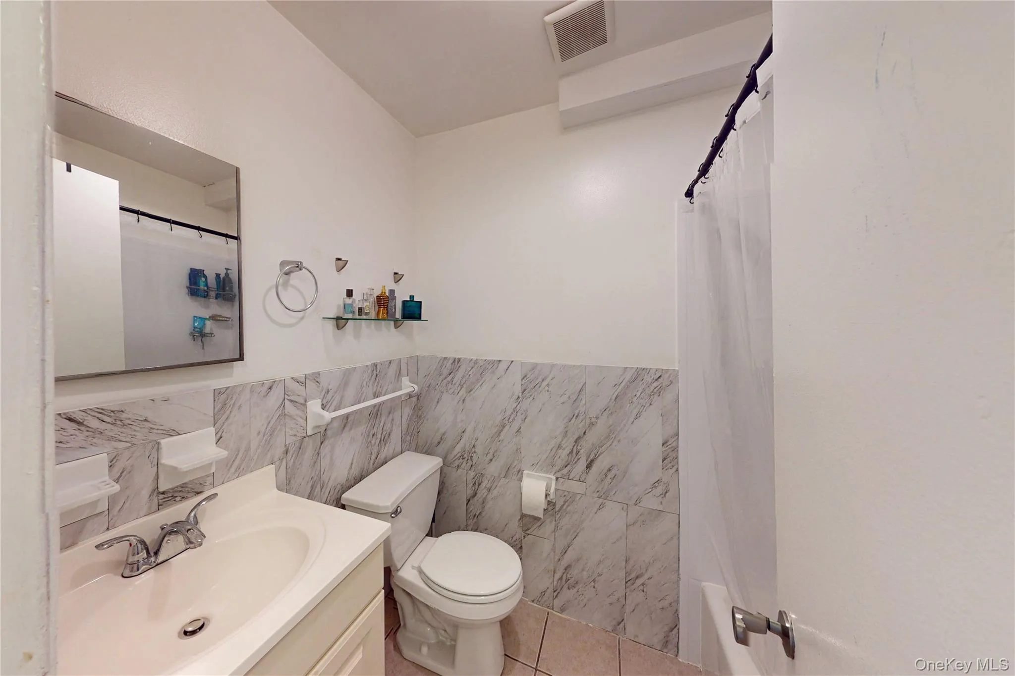 Bathroom featuring shower / tub combo Bathroom featuring shower / tub combo