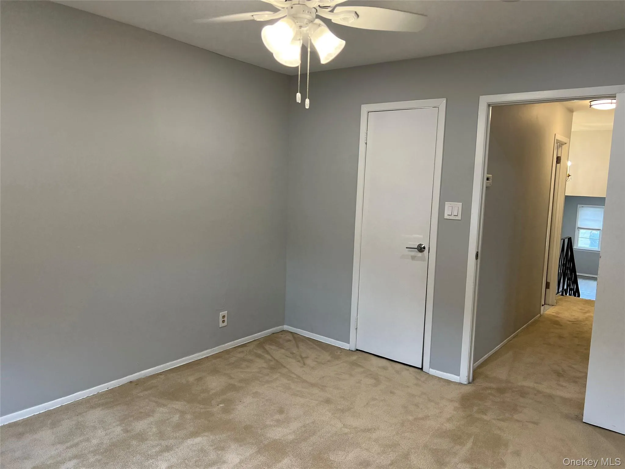 2nd Bedroom featuring light colored carpet and a ceiling fan 2nd Bedroom featuring light colored carpet and a ceiling fan