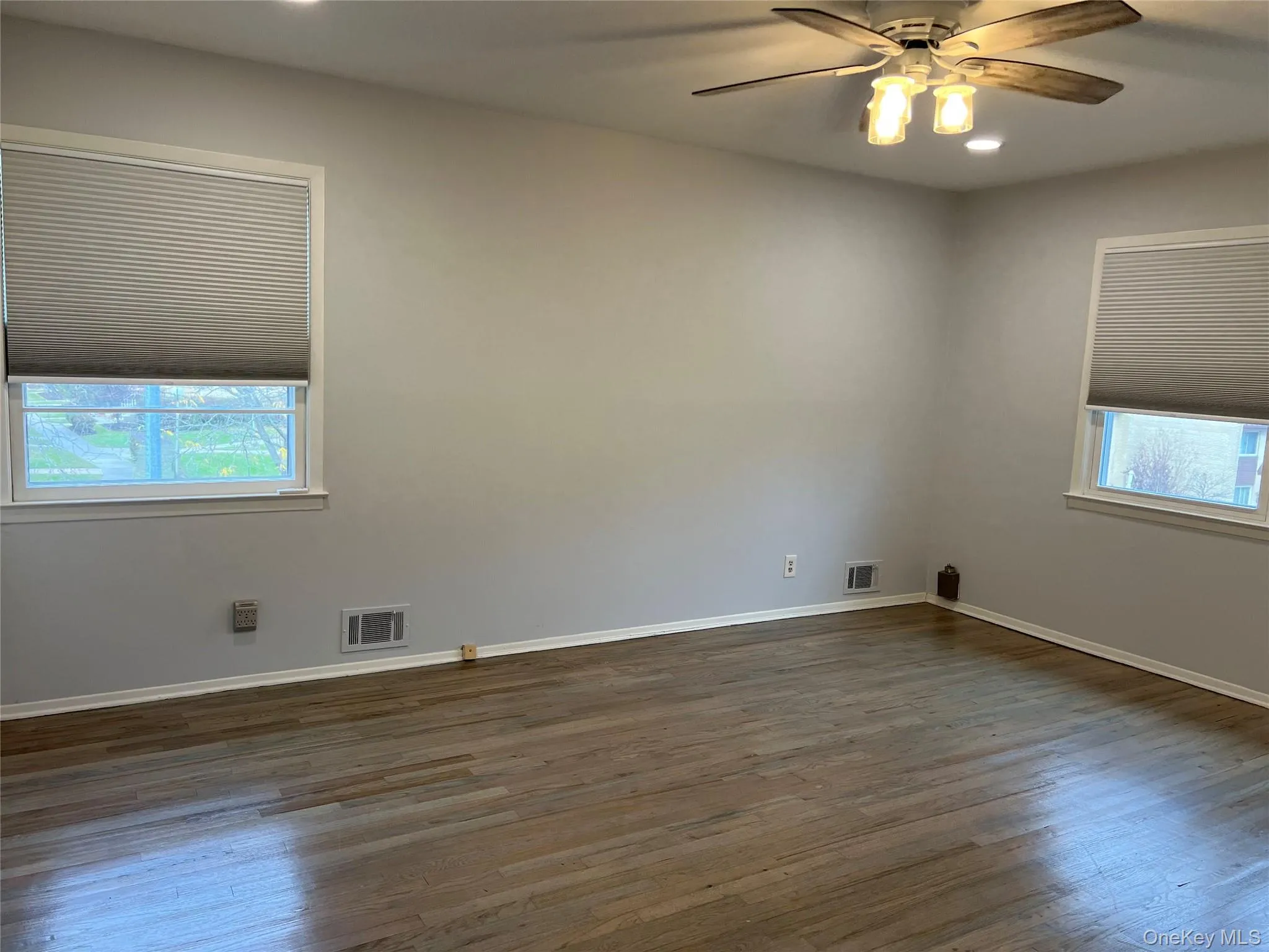Master Bedroom featuring recessed lighting, dark wood finished floors, and a ceiling fan Master Bedroom featuring recessed lighting, dark wood finished floors, and a ceiling fan