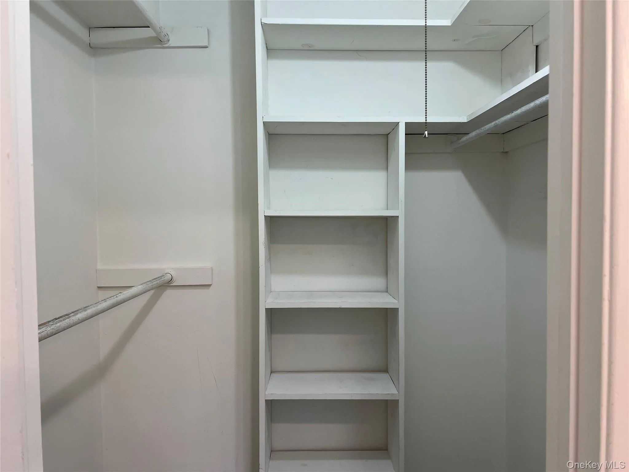 View of walk in closet View of walk in closet