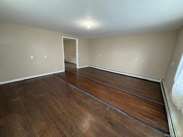 Spacious with hardwood flooring. Spacious with hardwood flooring.