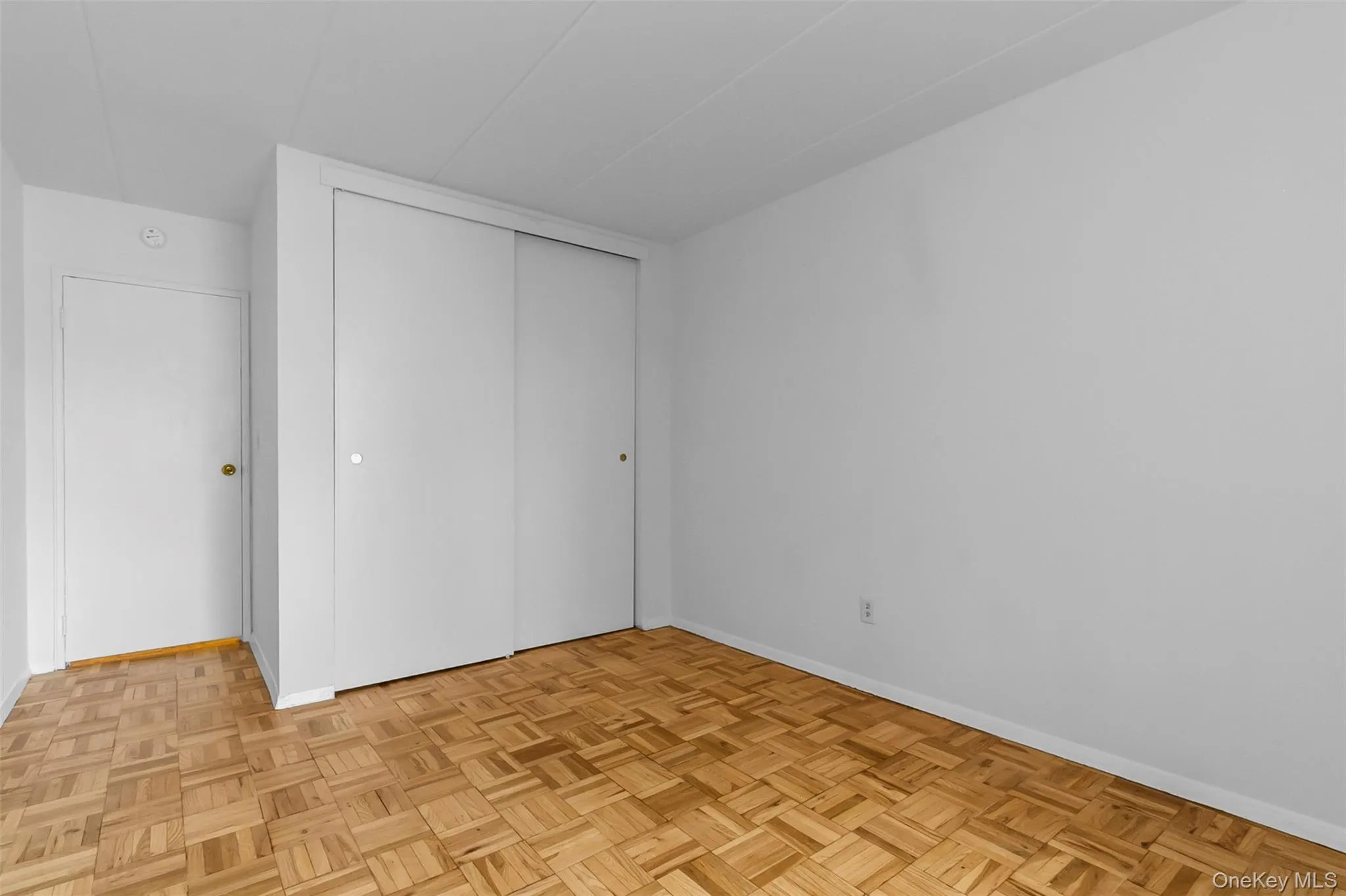 Unfurnished bedroom featuring a closet and baseboards Unfurnished bedroom featuring a closet and baseboards