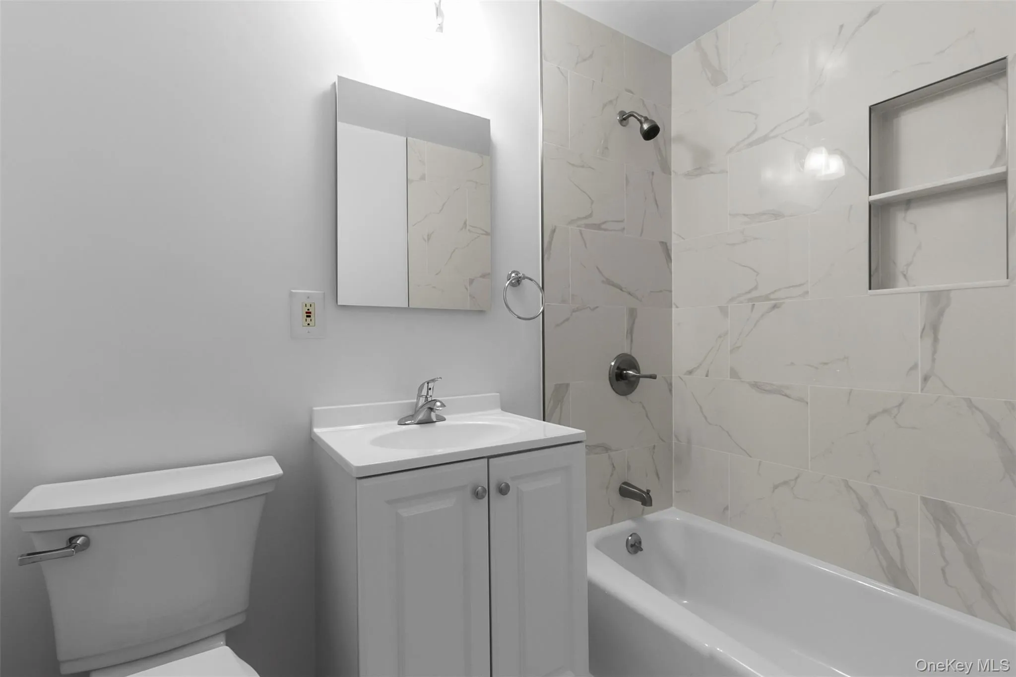 Bathroom with washtub / shower combination and vanity Bathroom with washtub / shower combination and vanity