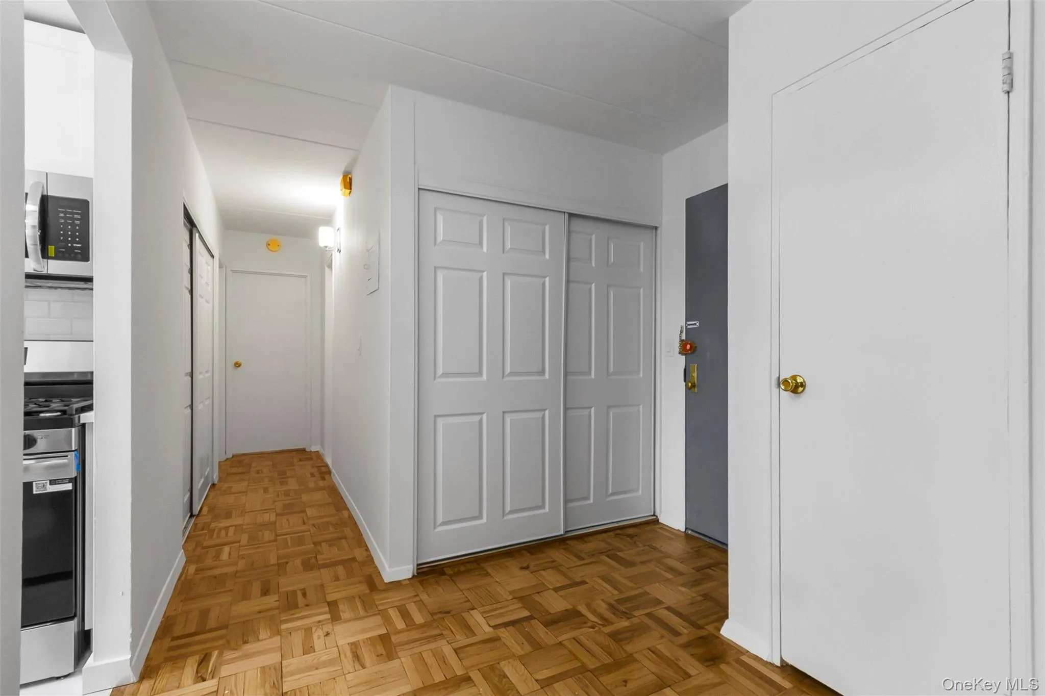 Hall featuring baseboards Hall featuring baseboards