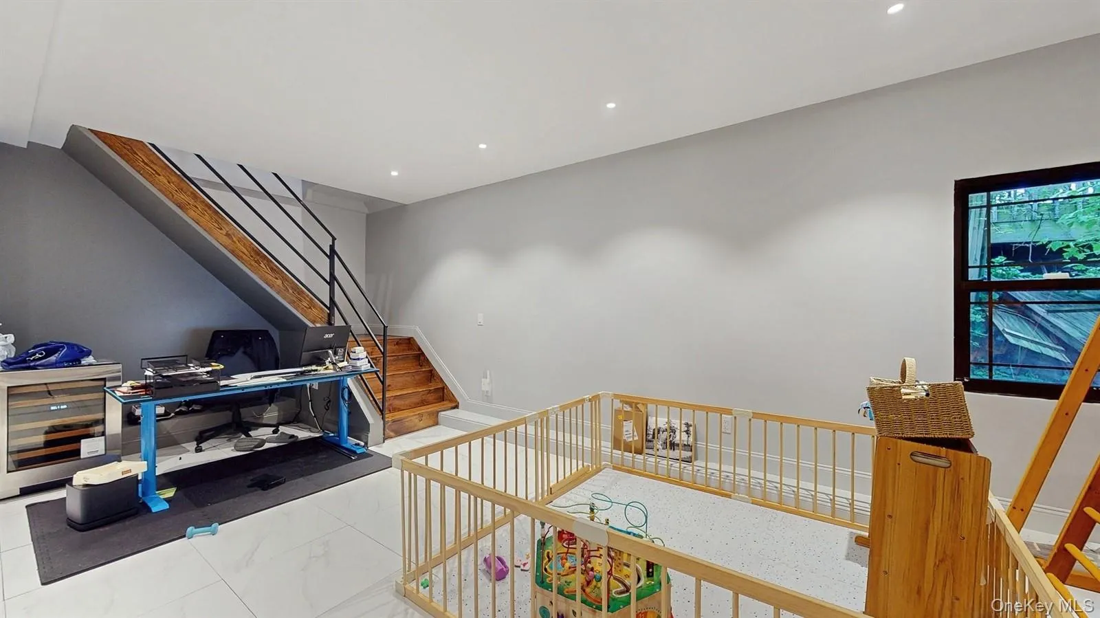 2nd Lower Level Multi-purpose Room. View of stairway up to 1st Lower Level. Stairway featuring recessed lighting and marble finished floors. 2nd Lower Level Multi-purpose Room. View of stairway up to 1st Lower Level. Stairway featuring recessed lighting and marble finished floors.