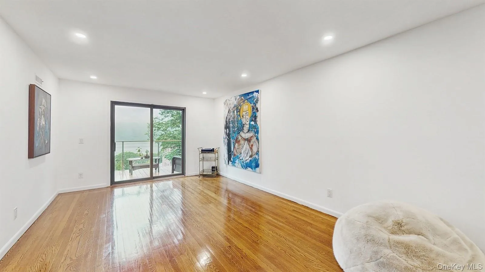 Sunlit, Spacious Room with light wood finished floors and lots of recessed lighting. Sunlit, Spacious Room with light wood finished floors and lots of recessed lighting.