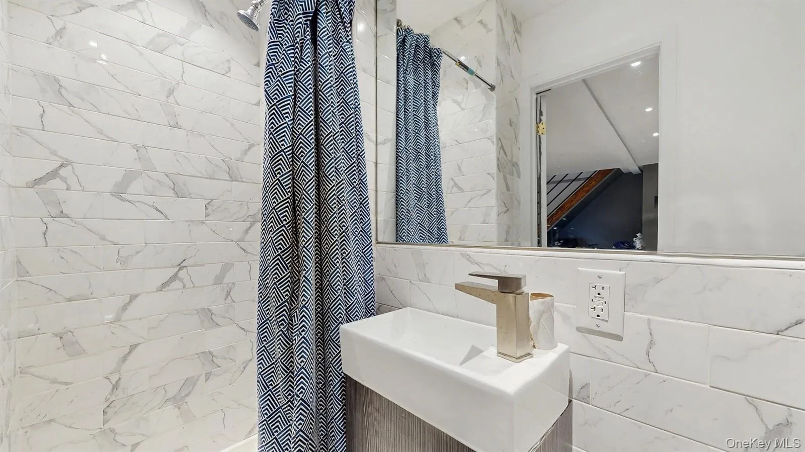 Shower bathroom with a tiled shower and walls. Shower bathroom with a tiled shower and walls.