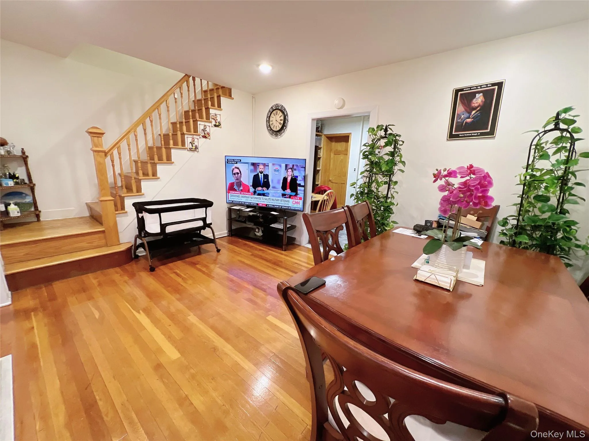 Dining area featuring light wood-style floors, stairway, and recessed lighting Dining area featuring light wood-style floors, stairway, and recessed lighting