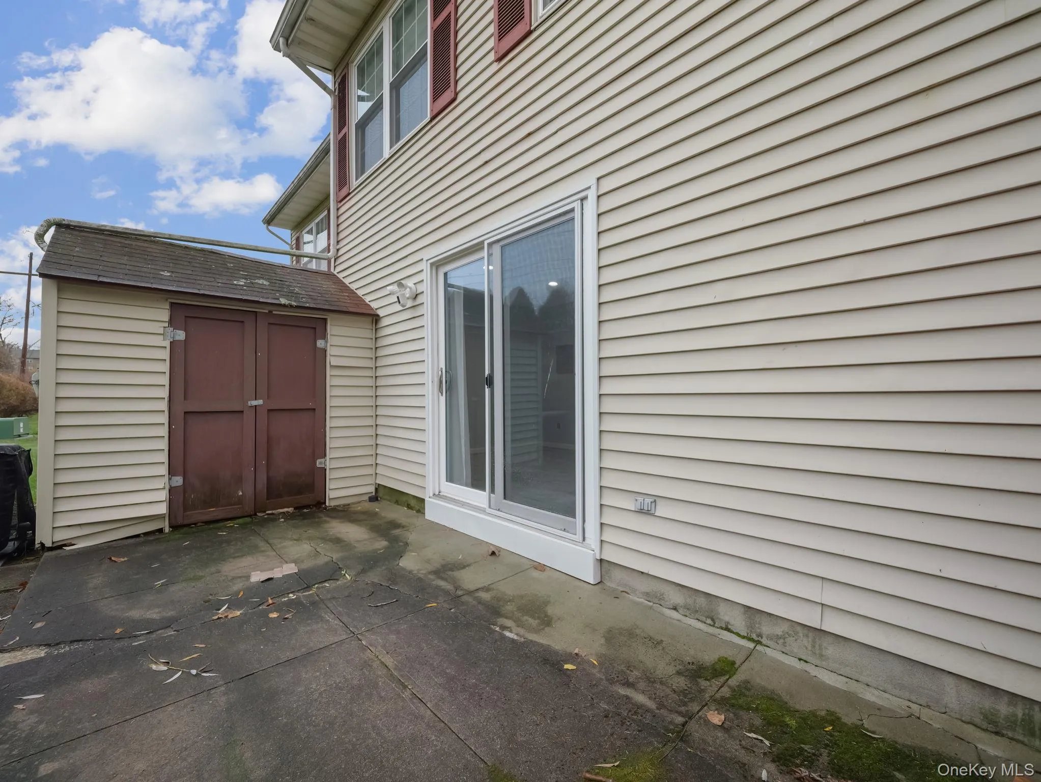 View of patio / terrace with a storage shed View of patio / terrace with a storage shed