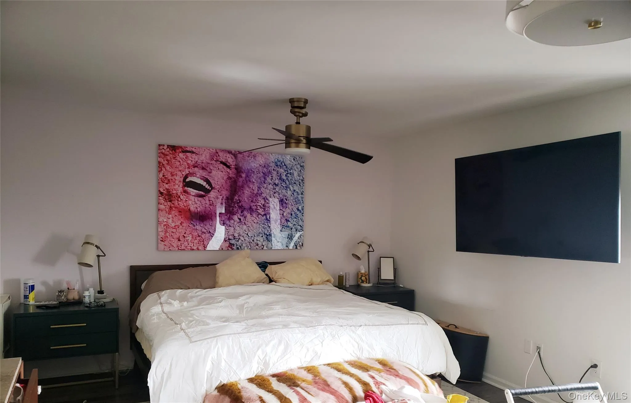 Bedroom featuring ceiling fan Bedroom featuring ceiling fan