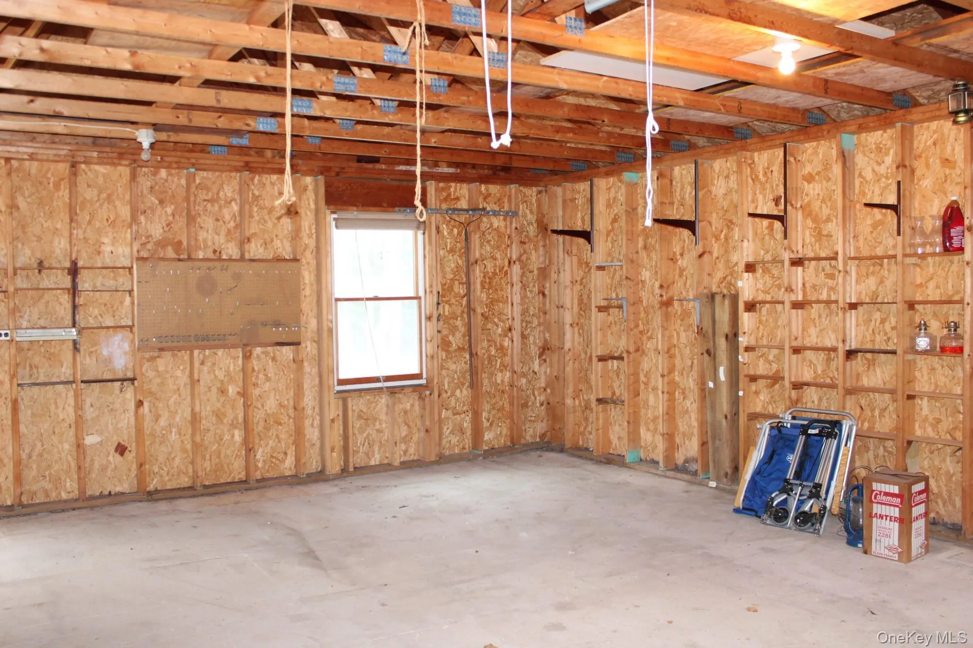 View of extra storage space in garage View of extra storage space in garage