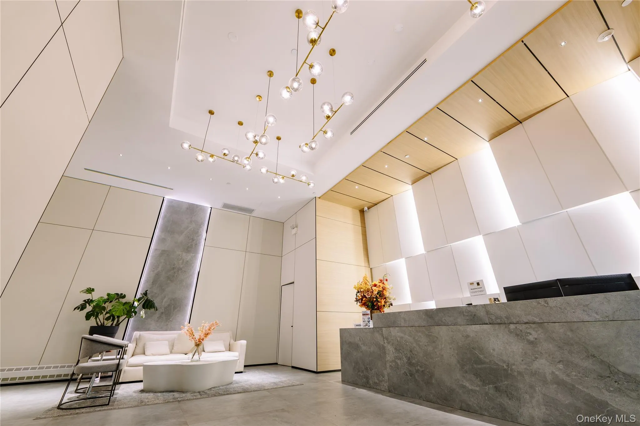 Reception area featuring a towering ceiling Reception area featuring a towering ceiling
