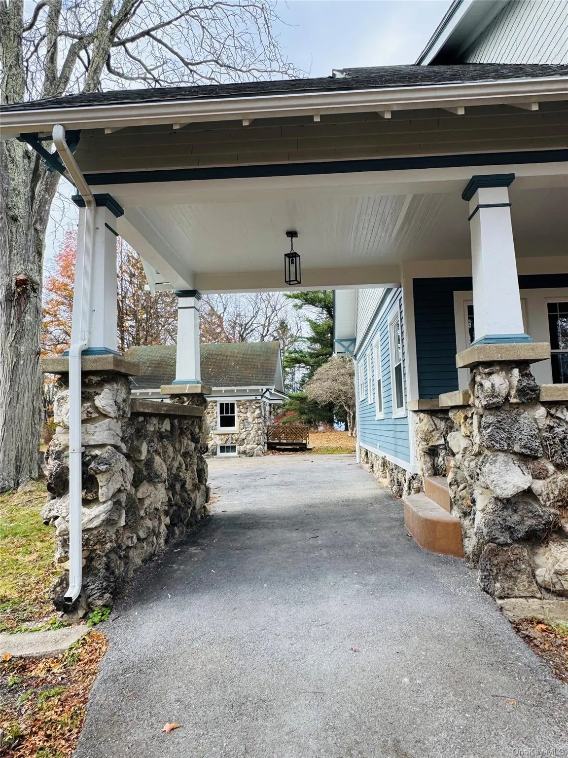 View of patio featuring driveway View of patio featuring driveway