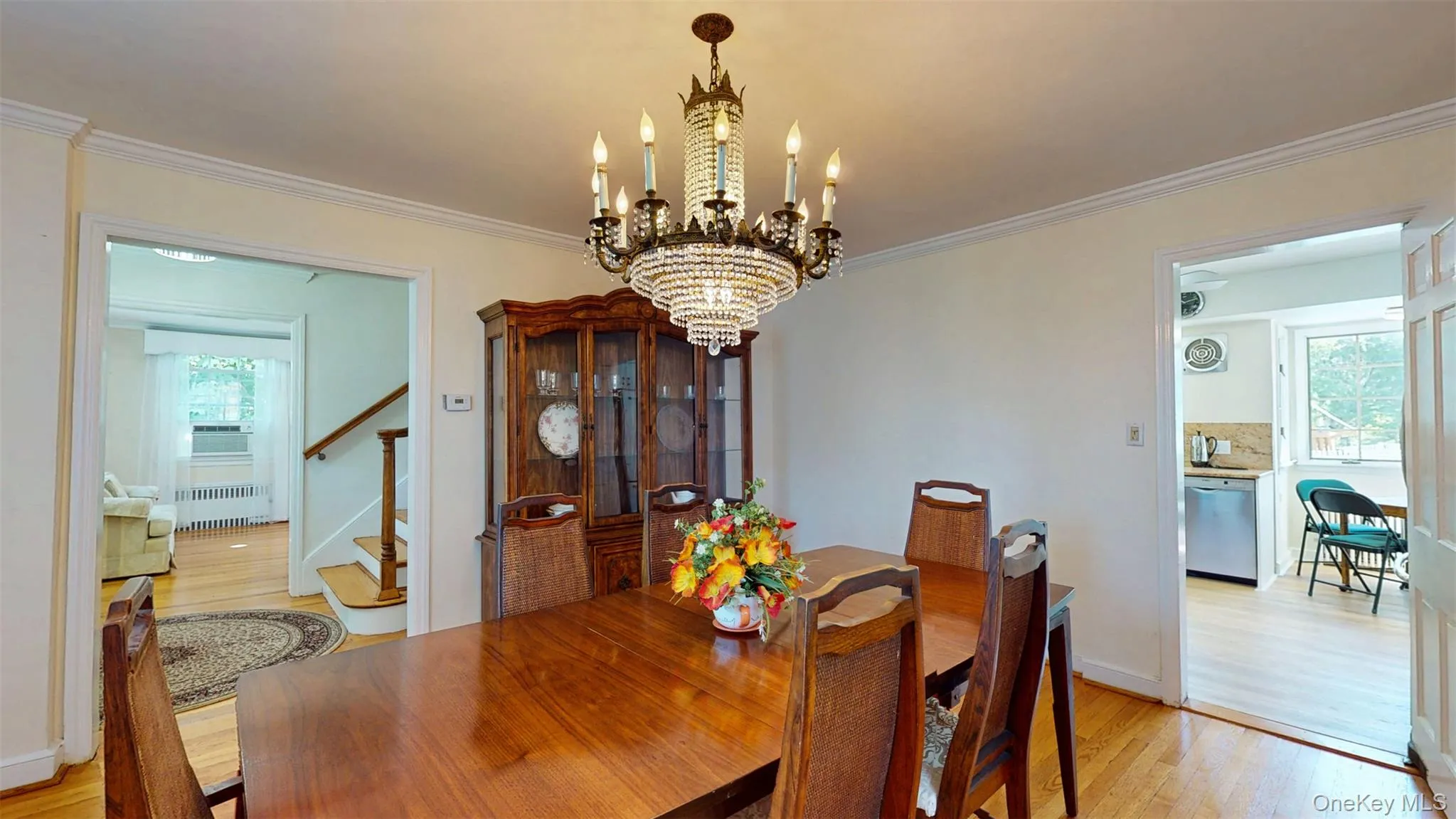 Formal Diningroom with recessed radiator, a chandelier, hardwood floors, crown molding Formal Diningroom with recessed radiator, a chandelier, hardwood floors, crown molding