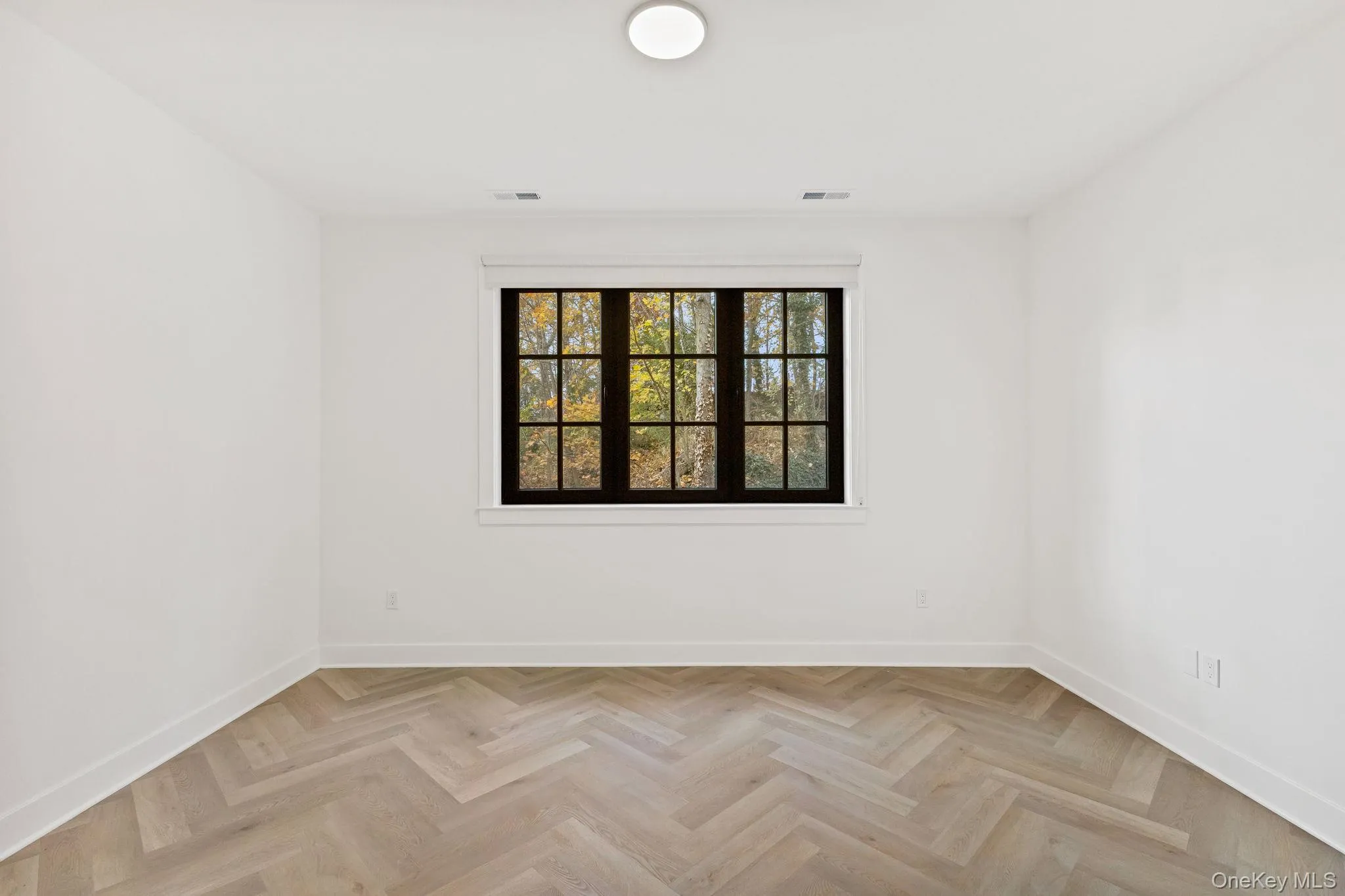 Unfurnished room featuring baseboards Unfurnished room featuring baseboards