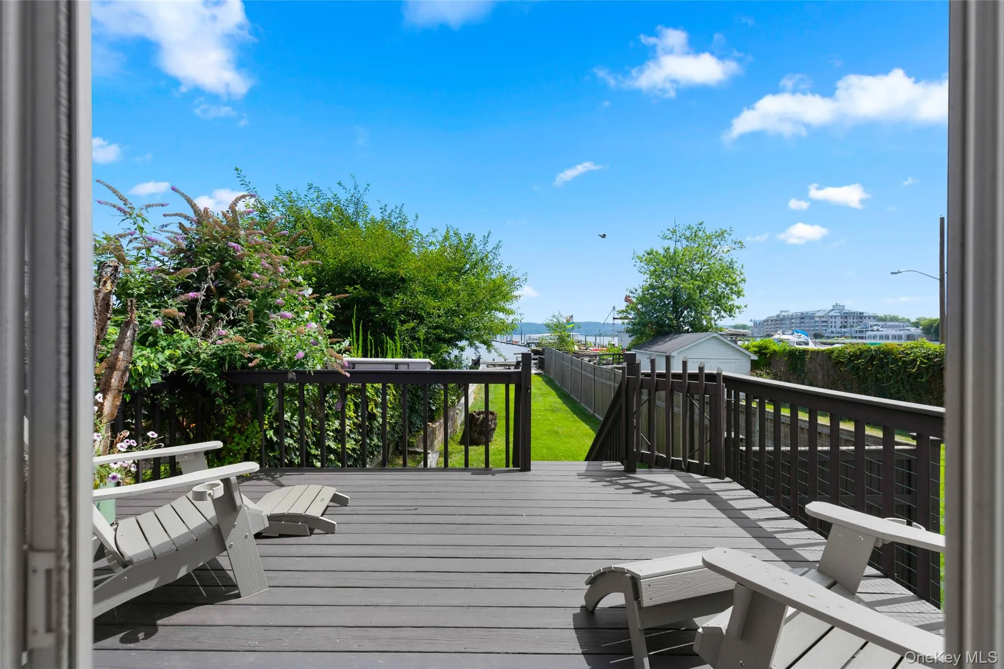 Wooden deck featuring an outbuilding Wooden deck featuring an outbuilding