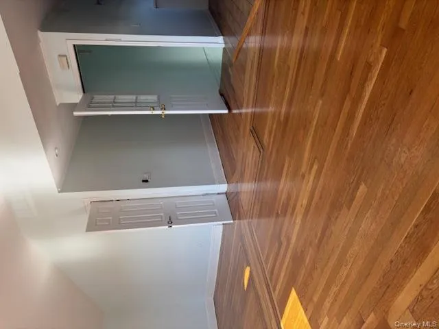 Unfurnished room featuring light wood-style flooring and baseboards Unfurnished room featuring light wood-style flooring and baseboards