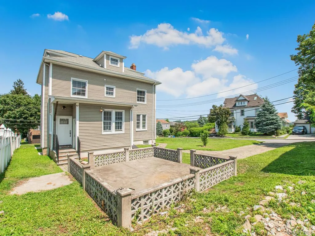 Rear view of property with a chimney Rear view of property with a chimney