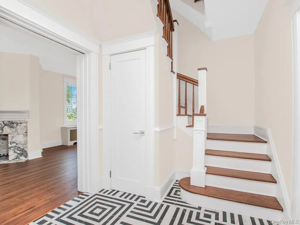 Stairs with wood finished floors and baseboards Stairs with wood finished floors and baseboards