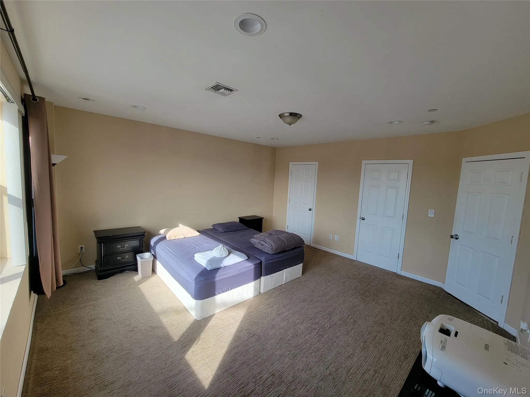 Carpeted bedroom featuring recessed lighting Carpeted bedroom featuring recessed lighting