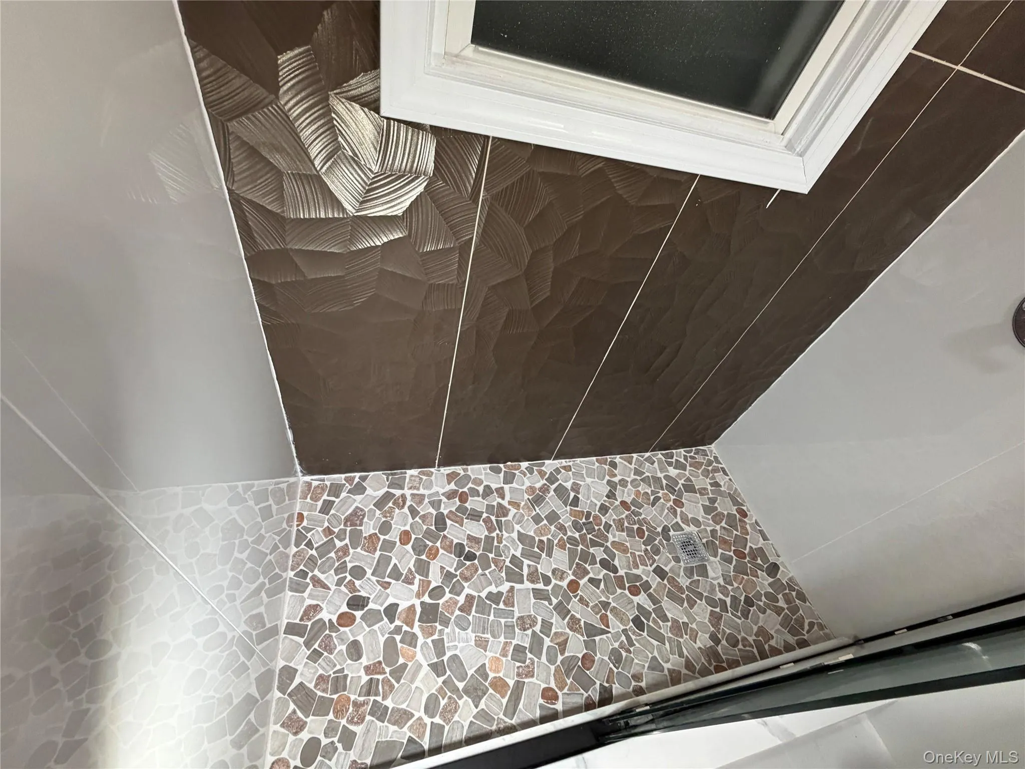 Bathroom view of tiled shower Bathroom view of tiled shower