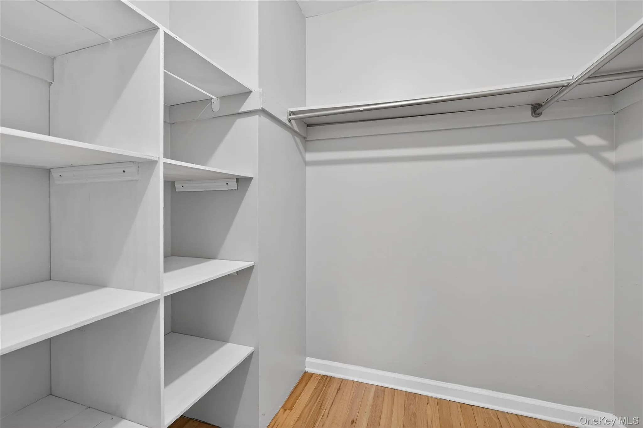 and a large walk-in closet with built-in shelving... and a large walk-in closet with built-in shelving...