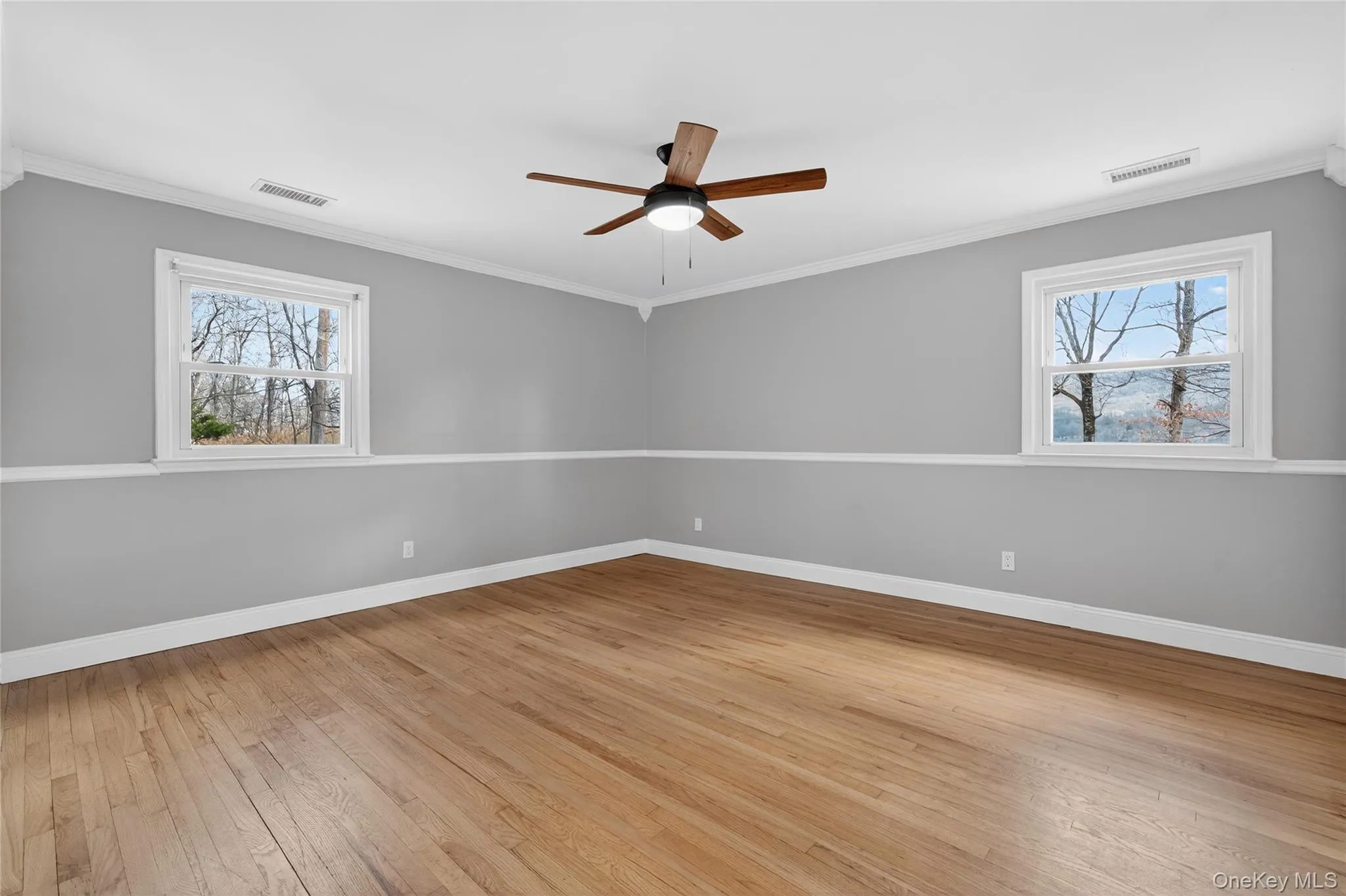 With two windows, ceiling fan and hardwood floors, the large primary bedroom also has its own convenient ensuite... With two windows, ceiling fan and hardwood floors, the large primary bedroom also has its own convenient ensuite...